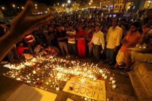 A candlelight ceremony at a Budapest railway station in memory of 71 refugees who died in a truck. Photo Source Reuters Laszlo Balogh