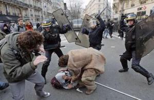 Police brutality at a protest in Paris. Source Getty