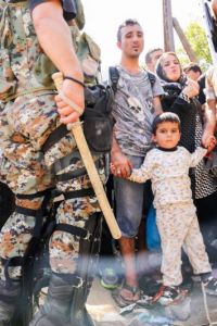 Refugees waiting for hours to cross the border to Macedonia. Photo by Erik Marquardt.