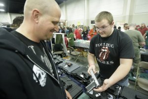Gun show in Utah. Photo Rick Bowmer, Associated Press.